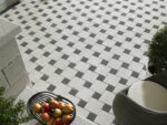 Kırmızı renkli, birbirine kenetlenen (Aşık) formdaki beton kilit taşının kesit görseli.