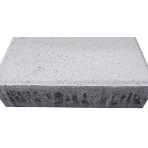 Açık renk dikdörtgen beton parke bloğunun kenar ve yüzey görünümü