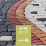 Üretici etiketli antik parke örneğinde antrasit, kırmızı, sarı ve açık renkli kavisli bantlar